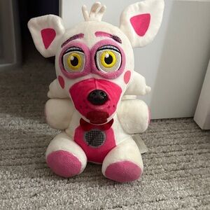 Pink and White Stuffed Animal Toy